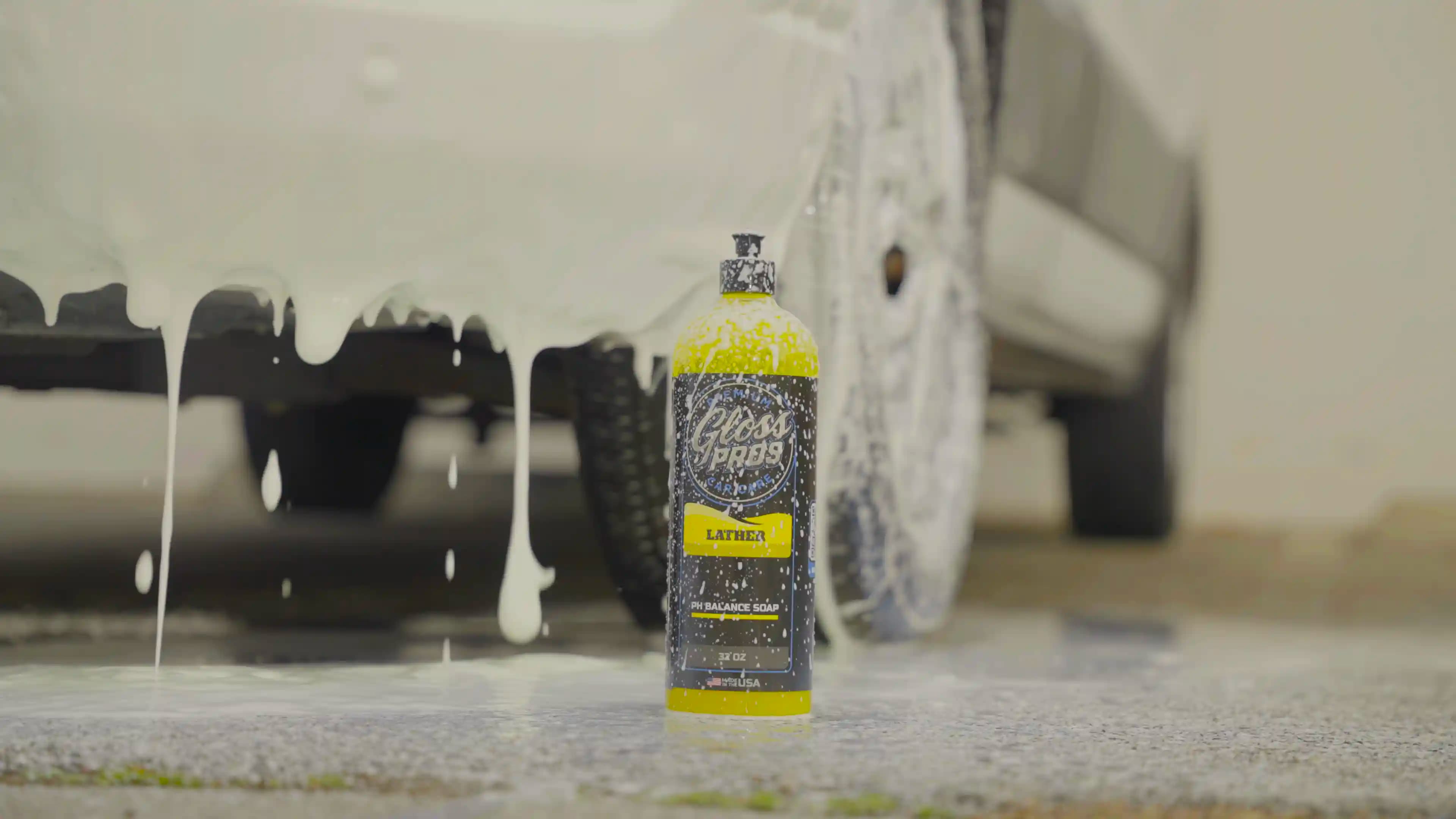 Gloss Pros Lather bottle on a clean garage wash cart with microfiber wash mitt and buckets