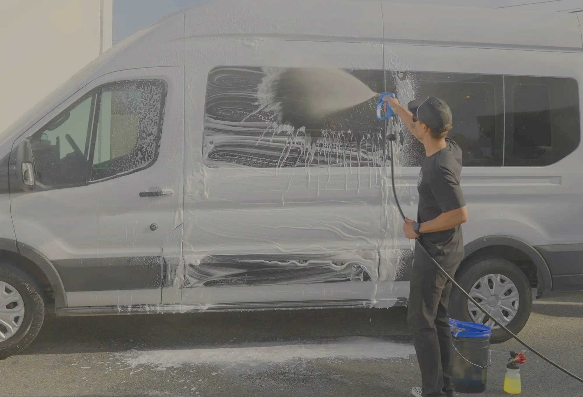 Water sheeting off a clean hood after rinsing