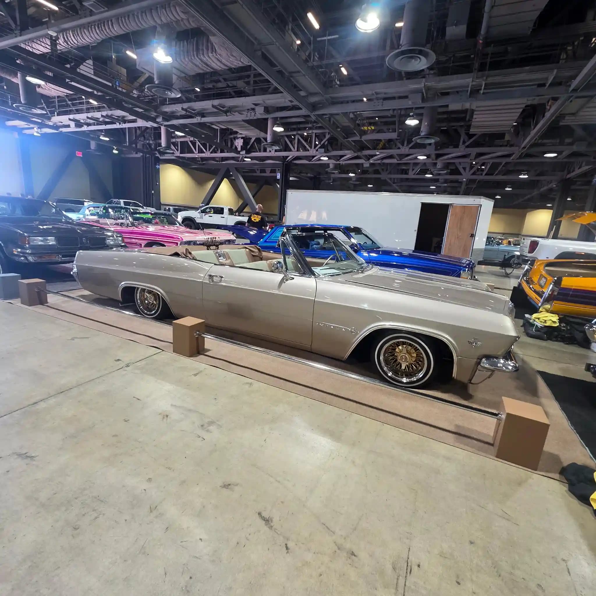 Wide side profile of the lowrider at the Long Beach Lowrider Super Show